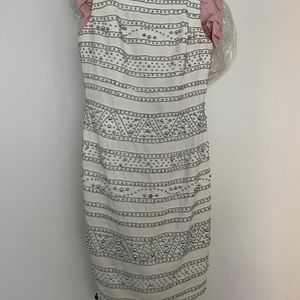 Carmen Marc valvo white and silver beaded gown